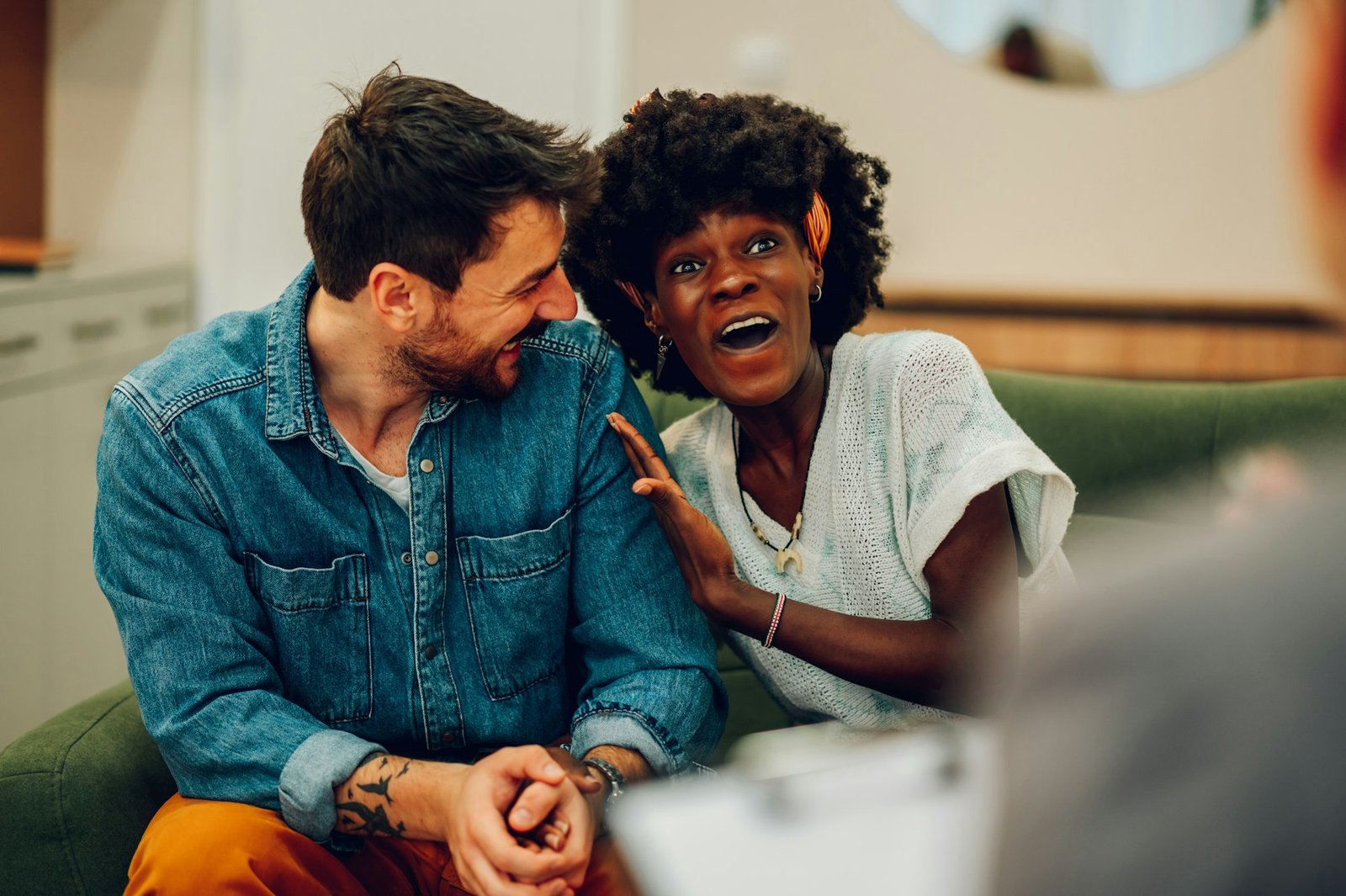 Diverse couple on a therapy session in a psychologist office